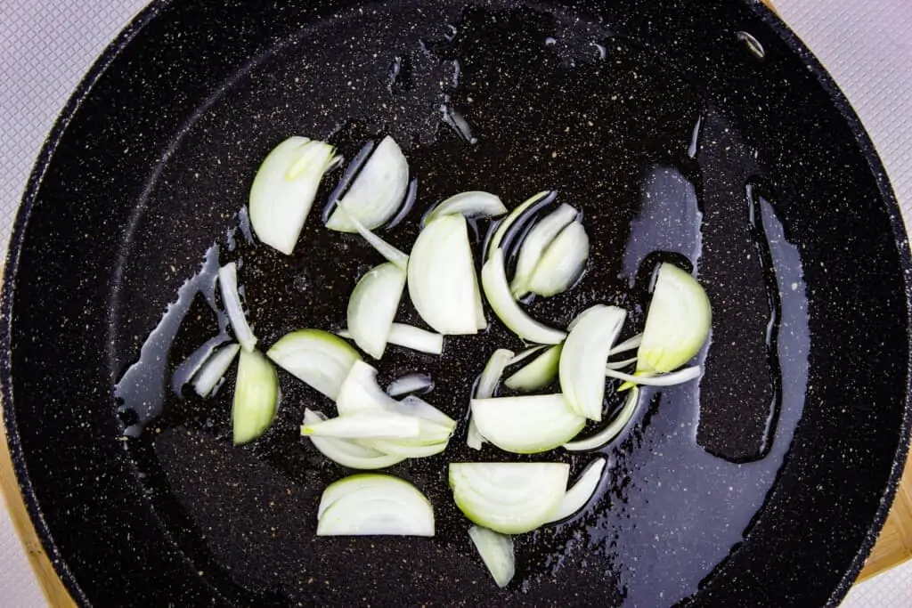 sauteeing onions for keto chicken fajita skillet