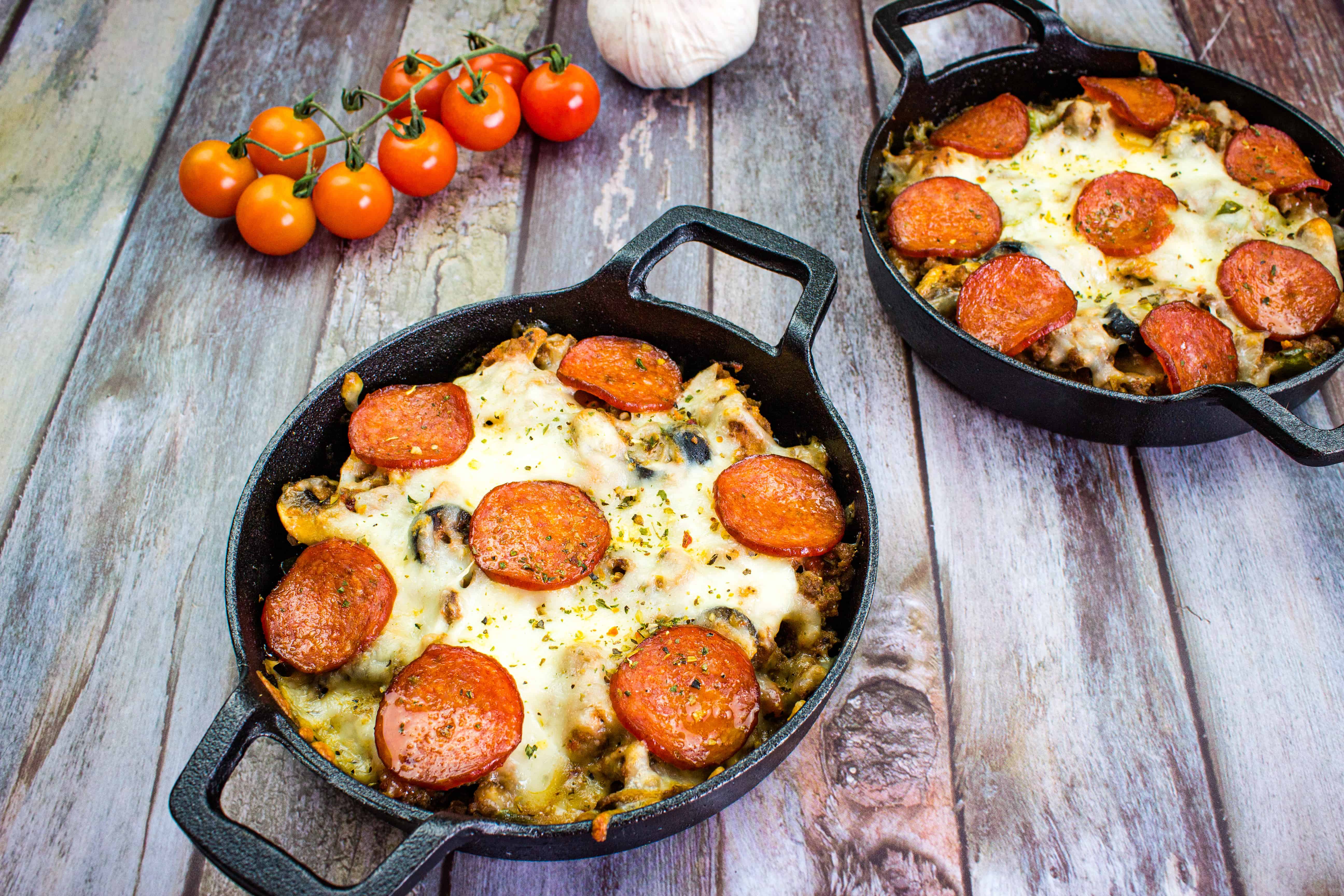 Pizza Casserole in 2 black dishes.