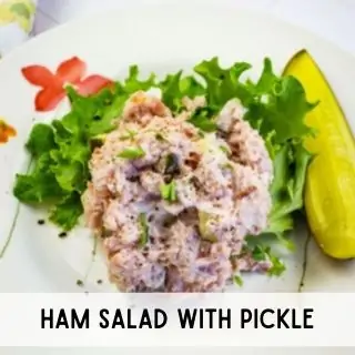 ham salad with pickle on a plate