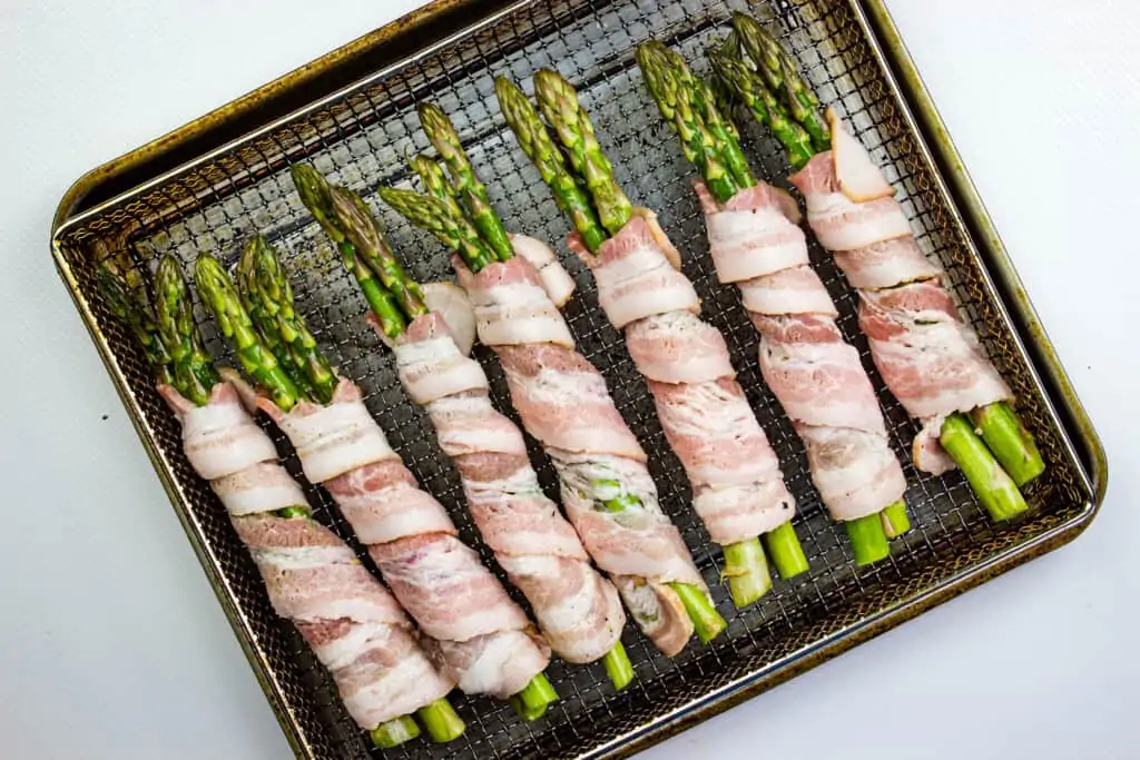 bacon wrapped asparagus ready for the air fryer