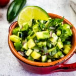 keto cucumber salsa in a cute red dish