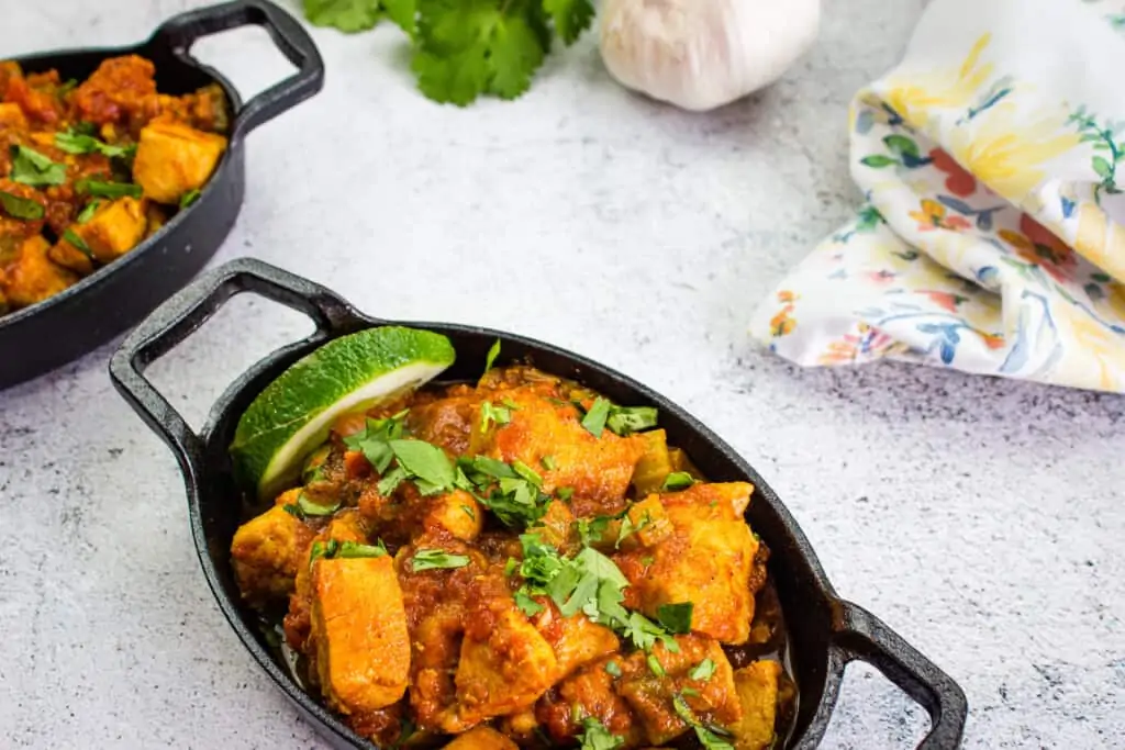 keto chicken chili in small black dishes