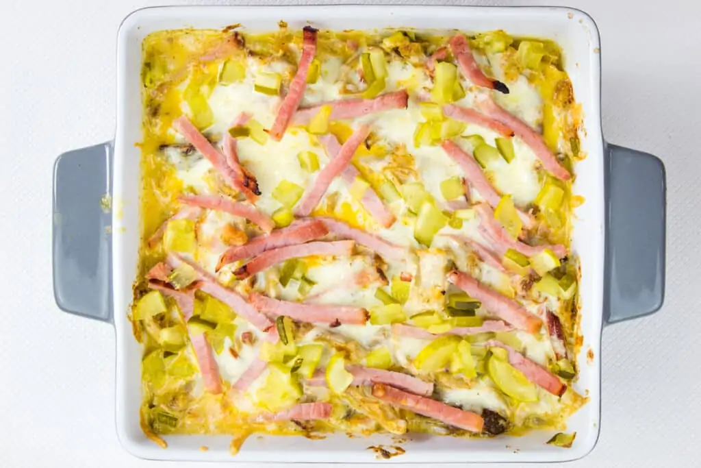 top with the remaining cheese, ham, and pickles and bake