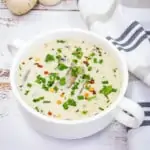 keto cream of mushroom soup in a white soup bowl