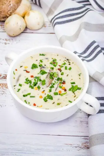 keto cream of mushroom soup in a white soup bowl