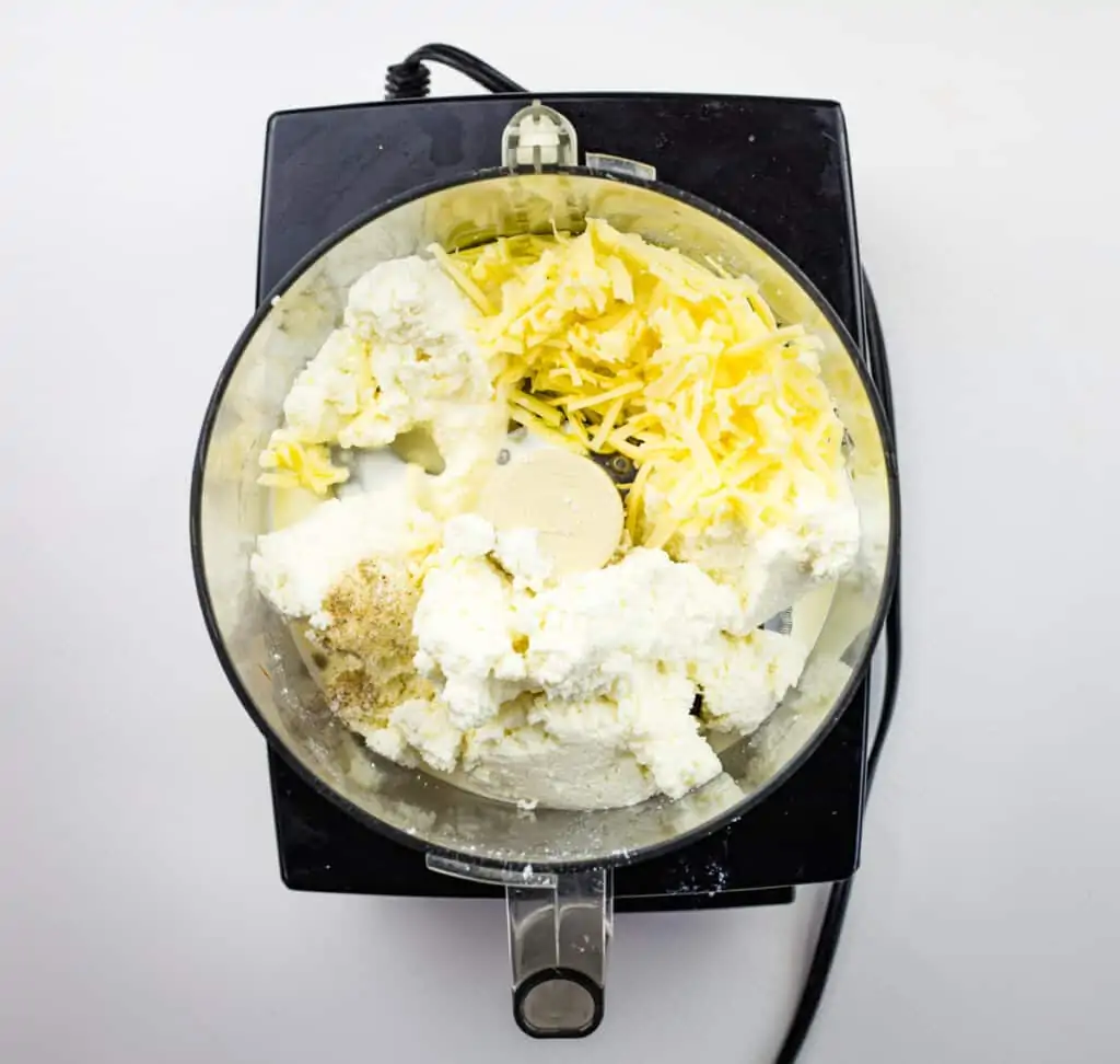 pulsing ricotta dip ingredients in a food processor