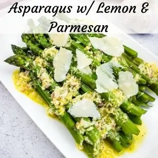 Asparagus with Lemon and Parmesan on a white plate.