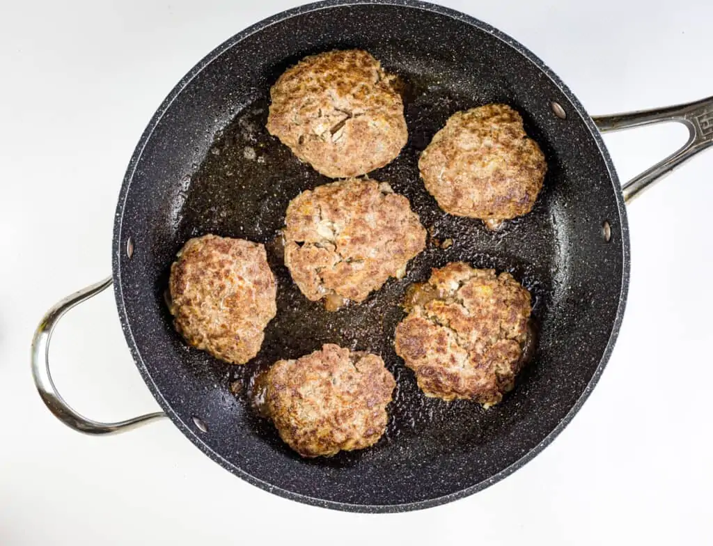 pan frying the beef patties for keto salisbury steak