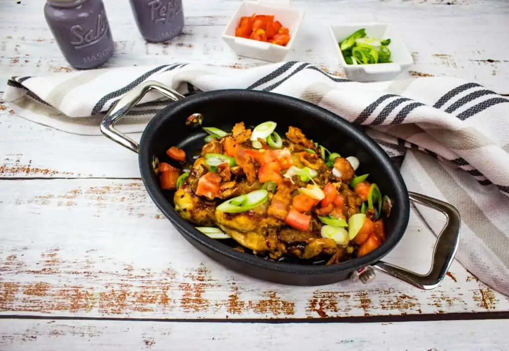 Keto Monterey Chicken in a black serving dish.