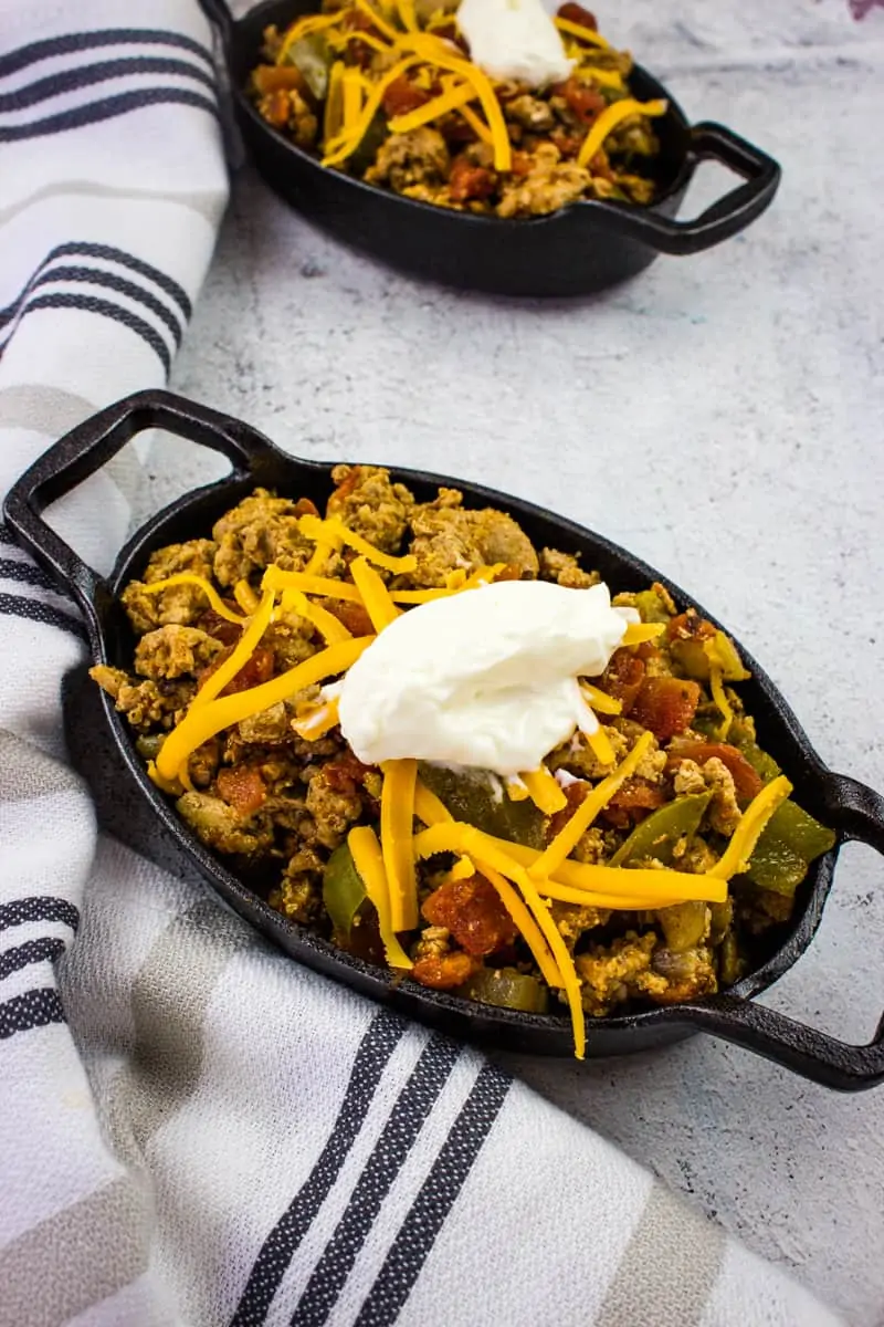 keto turkey chili in black serving dishes