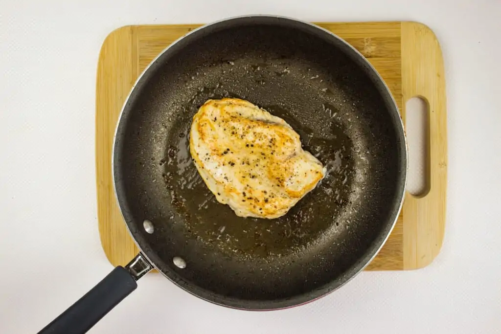 season chicken and brown in a skillet