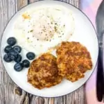 Keto Breakfast Sausage patties on a plate with a fried egg