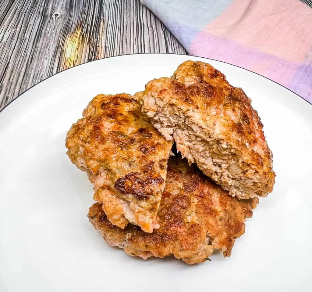 keto breakfast sausage patties on a white plate