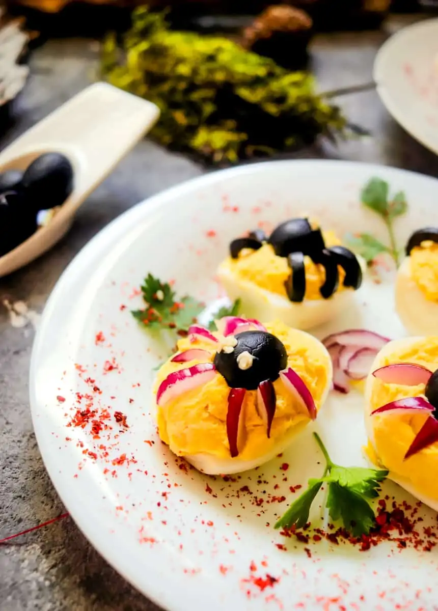 keto spider deviled eggs on a plate