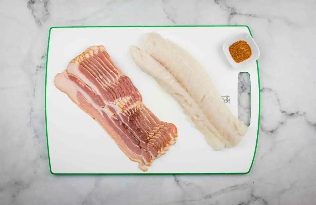 Ingredients to make bacon-wrapped cod.