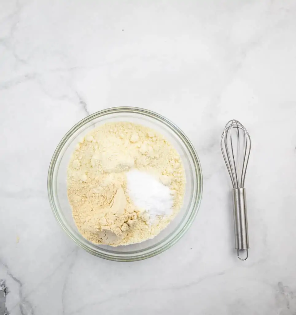 Mixing dry ingredients to make keto blueberry muffins