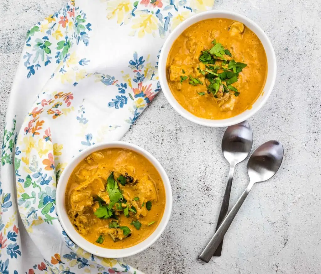 two servings of keto chicken tikka masala in bowls