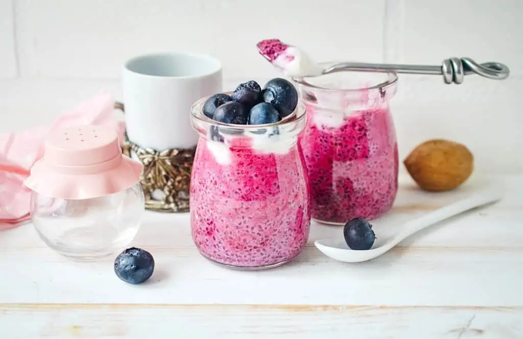 blueberry chia seed pudding in glass jars