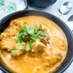 keto chicken tikka masala in a black serving bowl