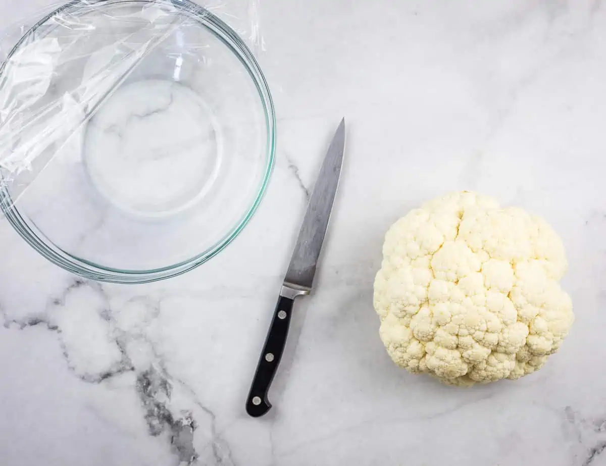 Steaming the cauliflower florets.