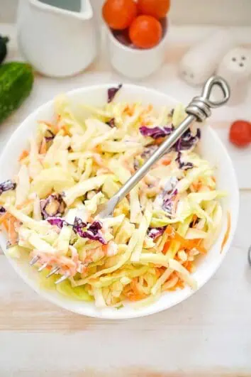 keto coleslaw in a bowl with a fork