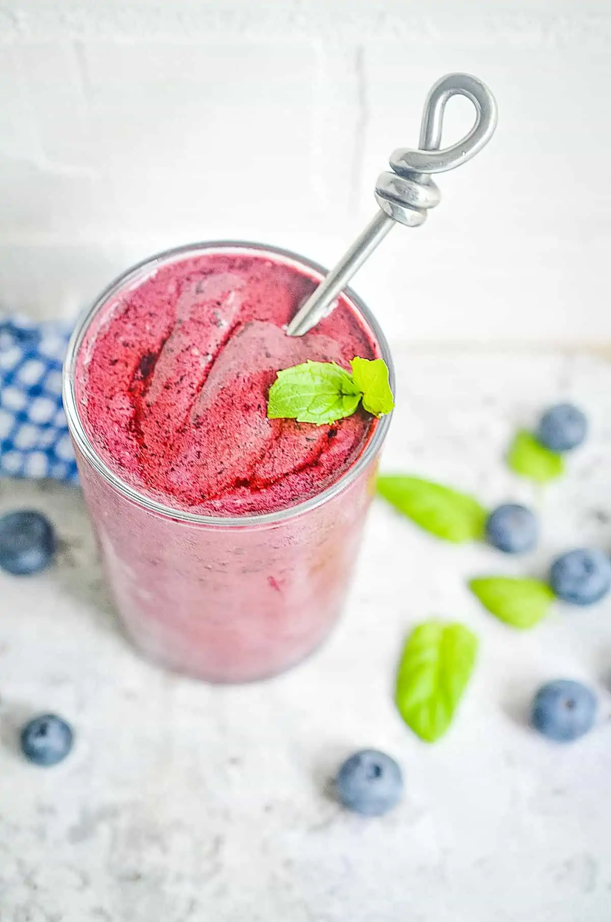 keto blueberry smoothies in a glass in a glass