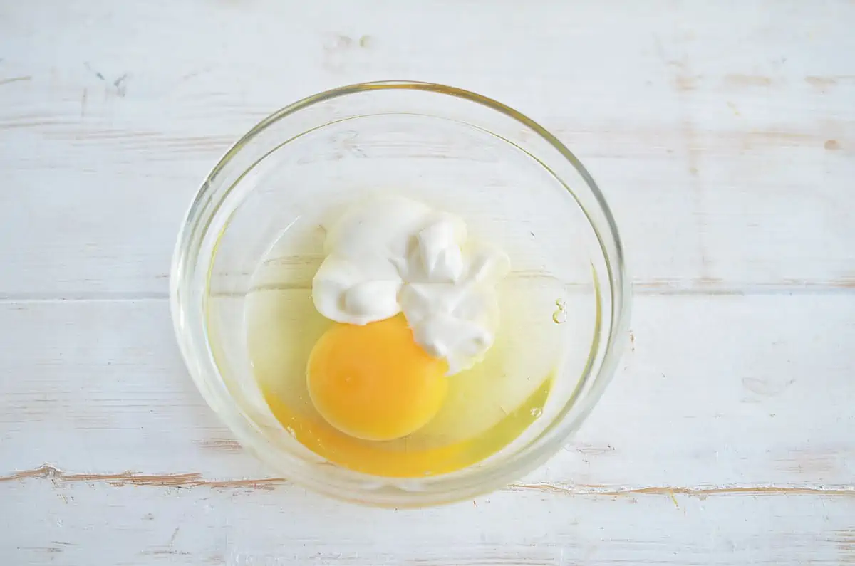 Egg and mayo in a bowl ready to be mixed.