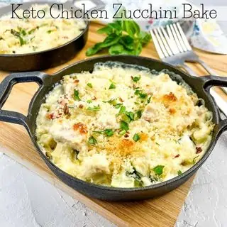 Keto chicken & zucchini bake in a black bowl.