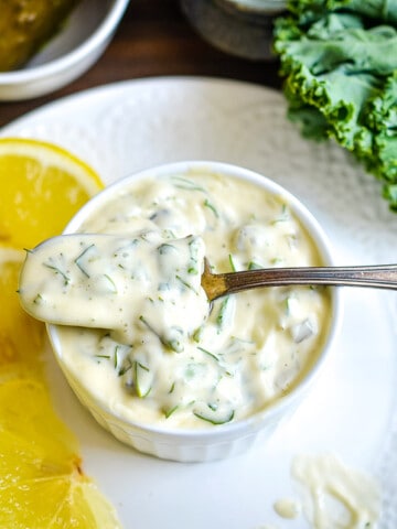 A white bowl filled with Keto Tartar Sauce.