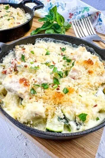 Keto Chicken and Zucchini Casserole in a black serving dish.