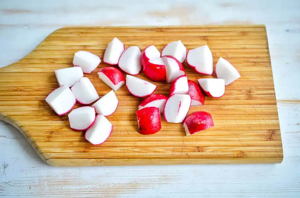 Cleaned and quartered radishes.