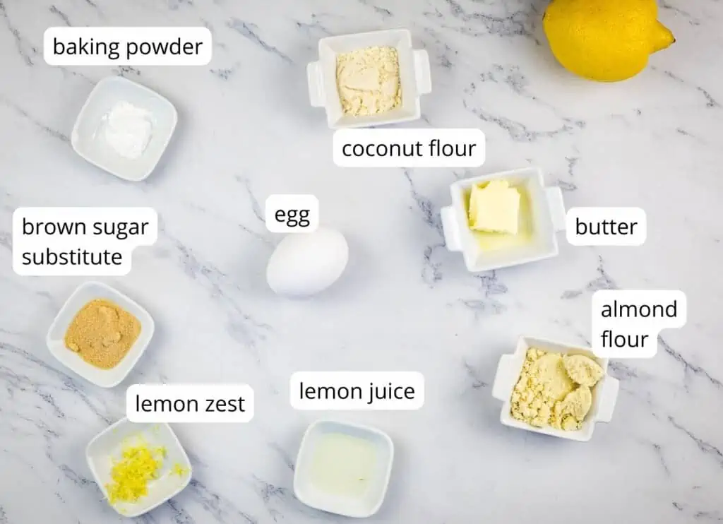 Labeled ingredients to make keto lemon mug cake.