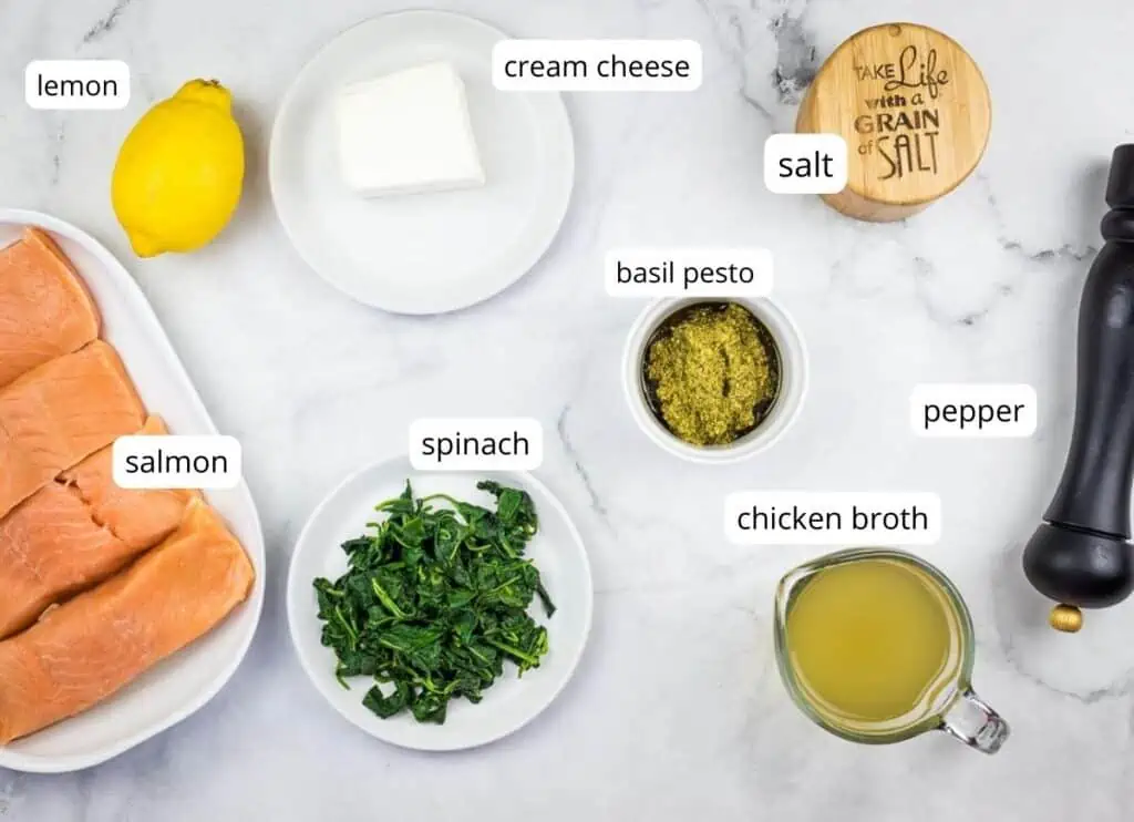 Labeled ingredients to make keto Baked Pesto Salmon.