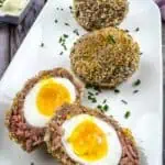 Keto Scotch Eggs on a white plate.