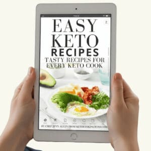 Someone holding a tablet with an Keto eBook displayed.