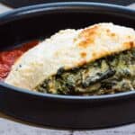 Close-up shot of Spinach Stuffed Chicken Breast on a pan.
