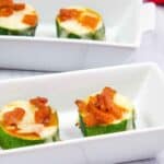 Two rectangular plates with Zucchini Pizza Bite.
